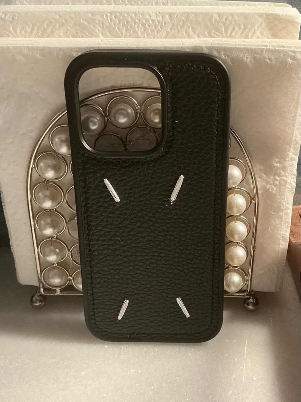 Sleek Black Textured Leather Phone Case with Contrast Stitching
